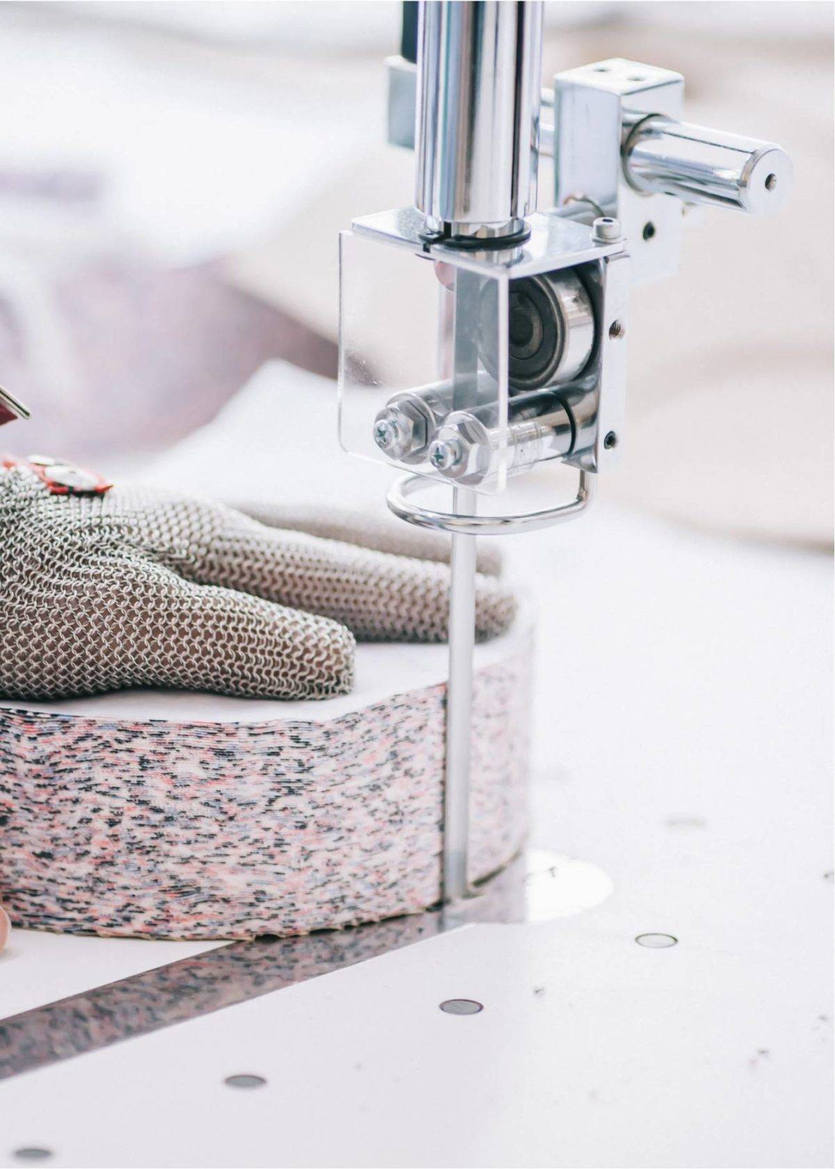 Cutting machine cutting patterned fabric