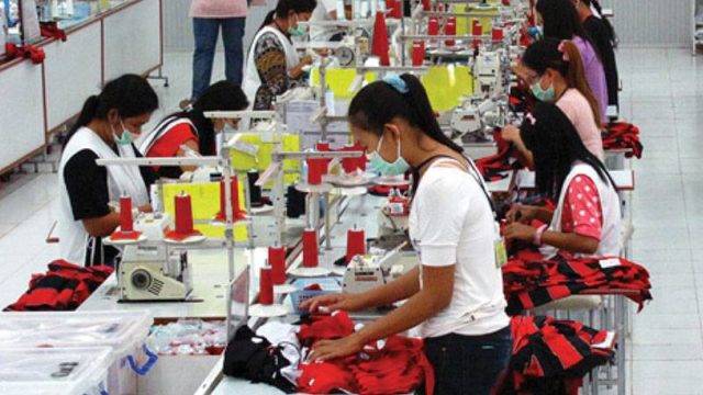 Nice Group production floor with workers and sewing machines