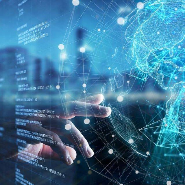 Hand pressing on virtual screen showing globe with connective nodes overlay